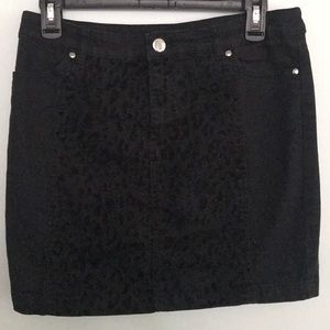H&M’s mini black leopard skirt with split